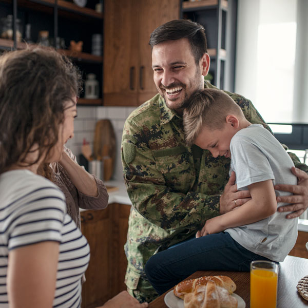 veteran with family in kitchen